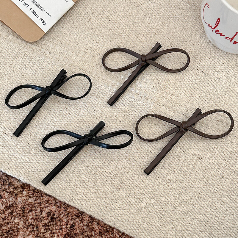 ヘアクリップ｜ヘアアクセサリー・韓国風・黒・レザー・バタフライ・クリップ・サイド・前髪・おしゃれ|undefined
