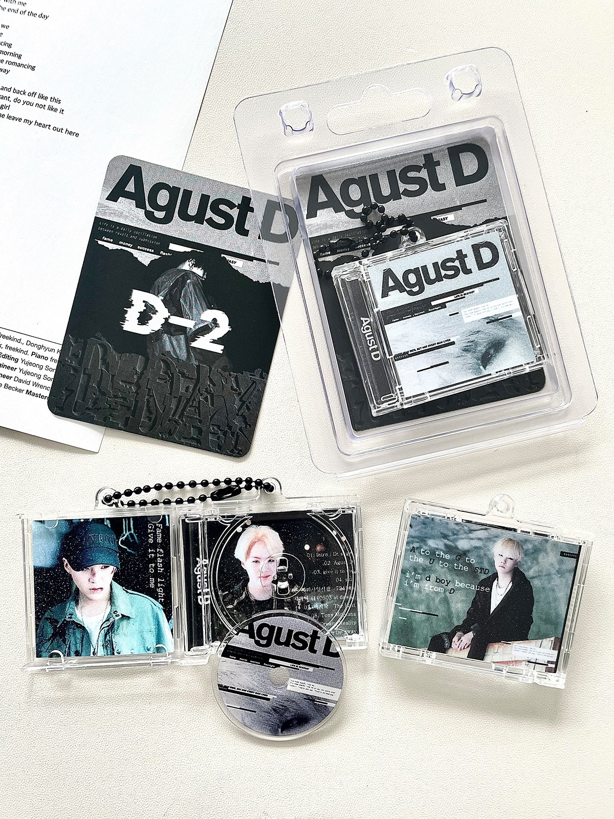 Agust D』アルバム型のホルダー｜推し活・BTS・ミニCDキーホルダー