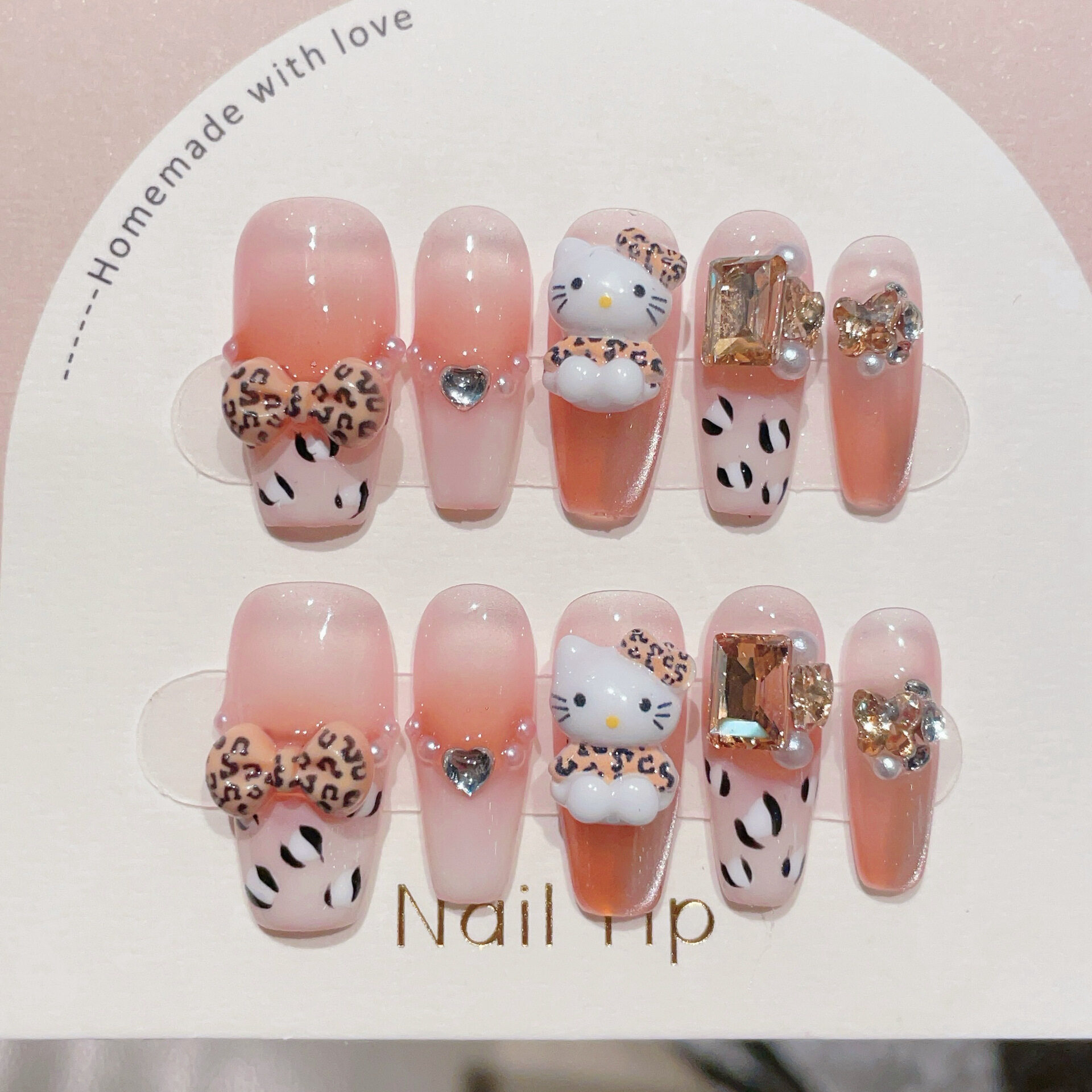 ネイルパーツ｜つけ爪・ハンドメイド・琥珀色・猫目・バタフライ結び・ネイルチップ・上品・美白効果|undefined